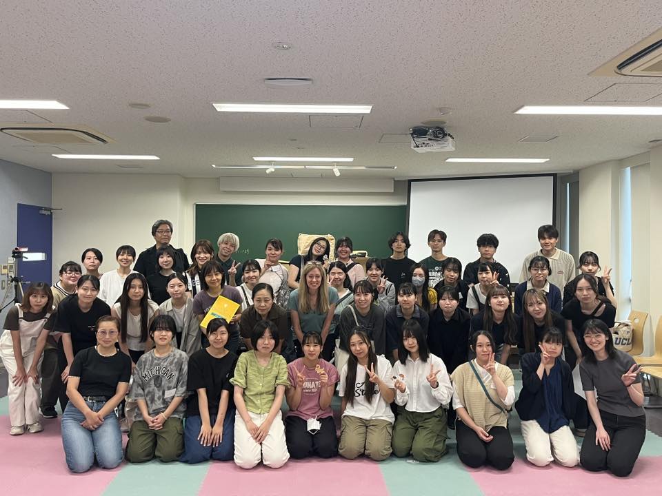 Veterinary technology students and instructors gathered in a classroom after a training session
